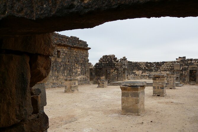 5-Desert Castles of Jordan Full-Day Private Tour from Amman - Qasr al-Azraq: the oasis-driven fortress near 100 km from Amman