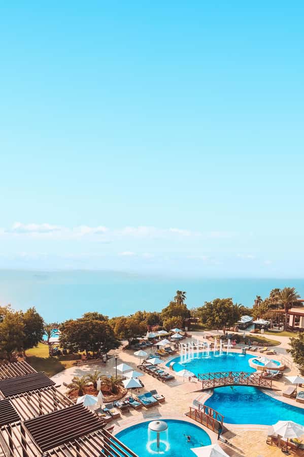 Amman: Ma'in Hot Springs and Dead Sea Day Trip - Dead Sea beach time, floating tricks that feel weirdly easy