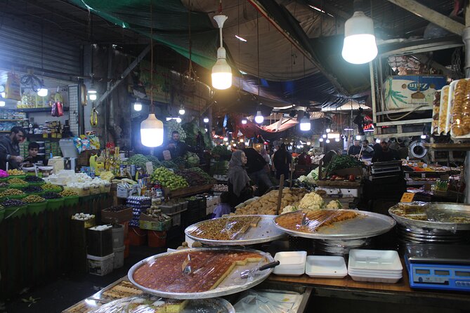 Day or Night Walking Tour in Downtown With Local - Price and value: what $24.99 buys you in real time