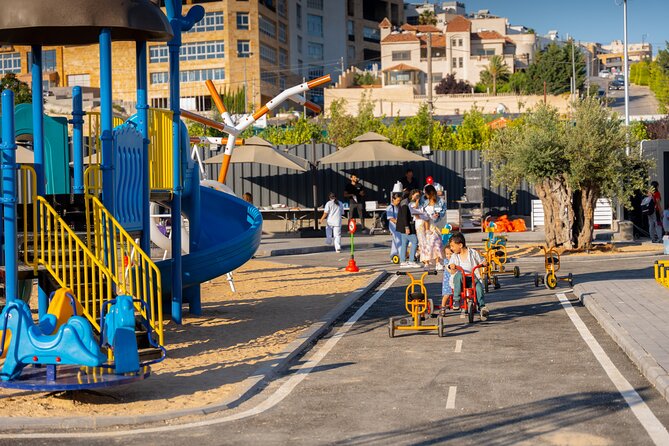 Discover Trax Jo Playground and Traffic Park Fun - Sand playground and clean play zones: The parent sanity factor