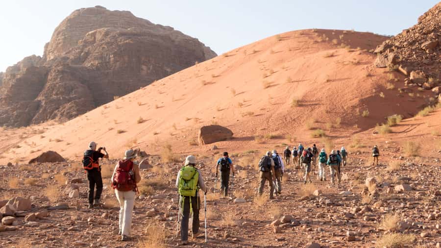 From Wadi Rum: 2-Day Hiking Adventure and Jeep Tour - Camp night in a Bedouin tent: tea, stories, and real stars