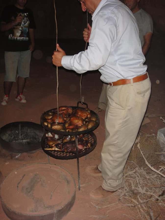 From Wadi Rum: Jeep Tour with Overnight Desert Camping - What you do at camp: Bedouin tea, campfire time, and sand-cooked dinner