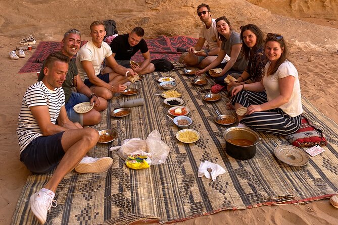 Full day Jeep Tour in Wadi Rum desert - Lawrence Spring: camels, a short climb, and that wide view