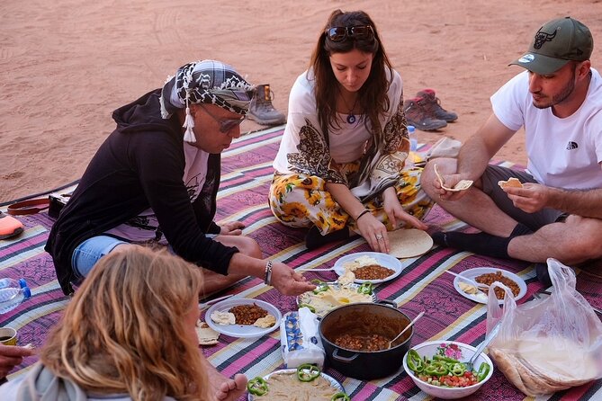 Full Day Jeep Tour in Wadi Rum (incl. Bedouin picnic lunch) - The Small Arch scramble: fun photos, real hands-on climbing