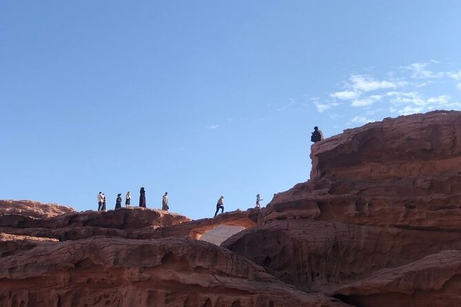 Full Day Jeep Tour & Traditional Lunch - Wadi Rum Desert Highlights - Lawrence’s House, Mushroom Rock, and the stone piles that explain the place