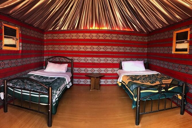 Full Day Jeep Tour with Overnight in Bedouin Camp - Wadi Rum Village First: Nabatean Temple, Lawrence’s Spring, and Khazali Canyon