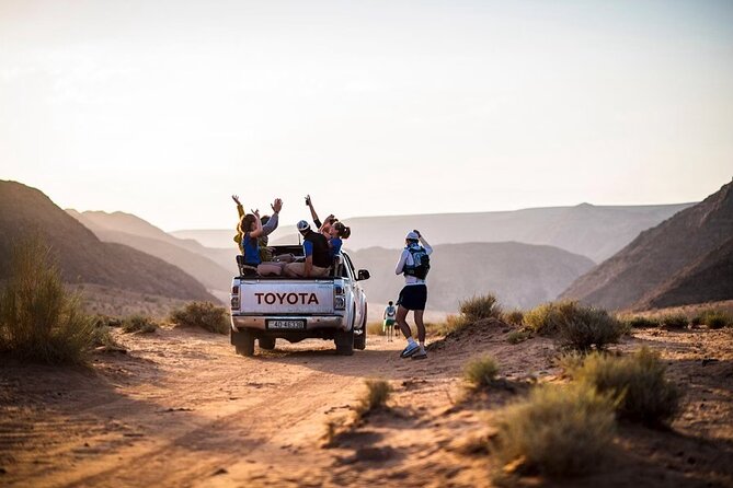 Full Day Jeep Tour with Overnight in Bedouin Camp - Red Sand Dunes and Little Bridge: Movie-Set Views and Easy Photo Wins