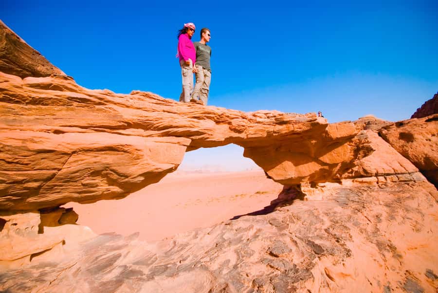 Wadi Rum: 10 Hour Jeep Tour Pass, Camel, Sandbording & Lunch - Sandboarding, the Fun Part That Needs a Safety Minute