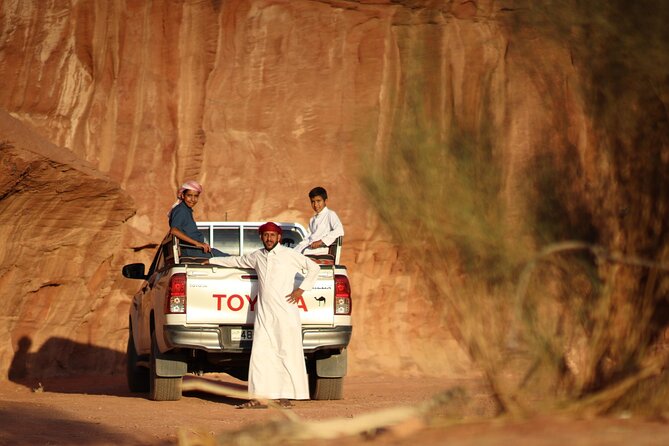 Wadi Rum 2-Day Jeep Tour with Meals and Overnight in Bedouin Camp - Lawrences Spring and Khazali Canyon: desert water and ancient walls