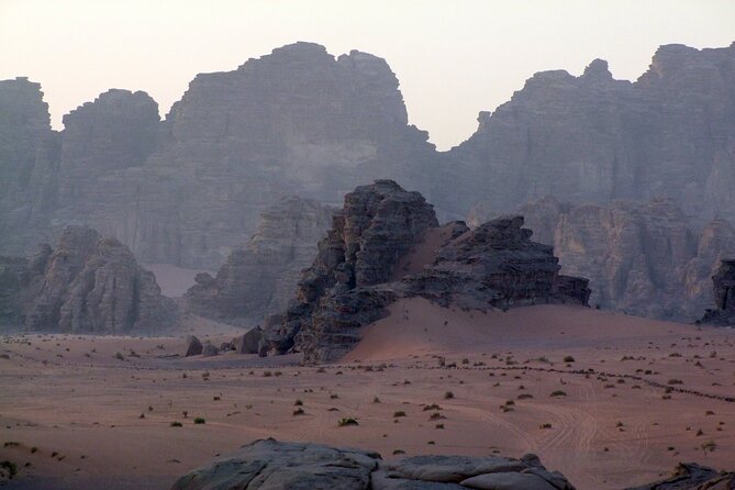 Wadi Rum: Explorer Jeep Tour PASS + Local Food + Optional Stay - Khazali Canyon and petroglyphs: why these canyon walls matter