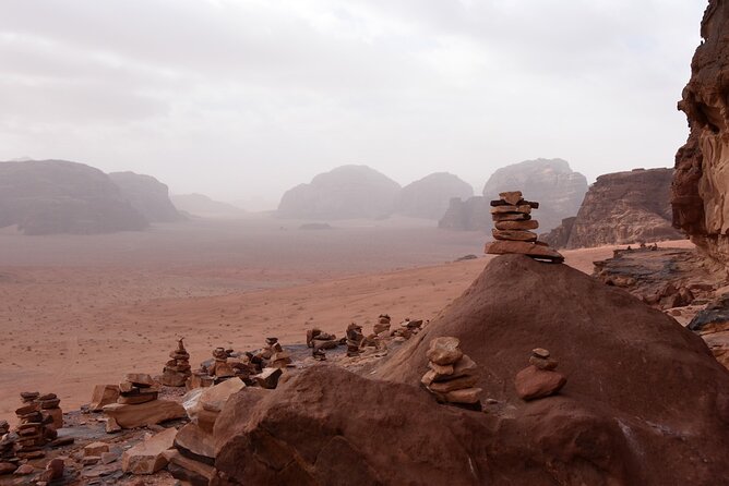 Wadi Rum: Explorer Jeep Tour PASS + Local Food + Optional Stay - Lawrence’s Spring: where the red desert turns into an oasis