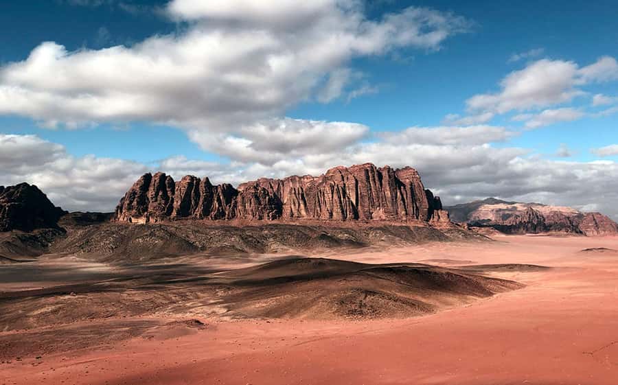 Wadi Rum:Full Day Tour Lunch Sand boarding Camel Ride Sunset - Red sand dunes and sandboarding: fun, plus a real workout