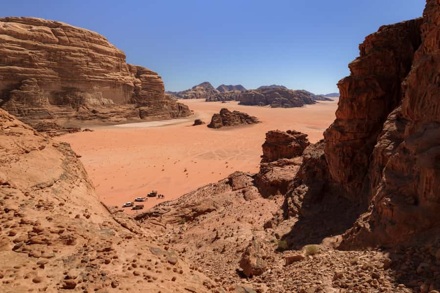 Wadi Rum: Guided Jeep Tour With Overnight Stay and Meals - Lawrence’s Spring, Red Sand Dune, and the famous names you’ll recognize