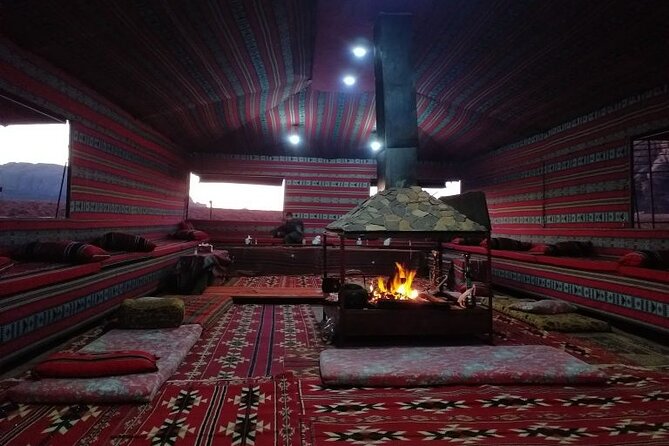 Wadi Rum Jeep Tour & Camp; Overnight - Bedouin camp night: dinner cooked under the ground, fire conversation, then stars