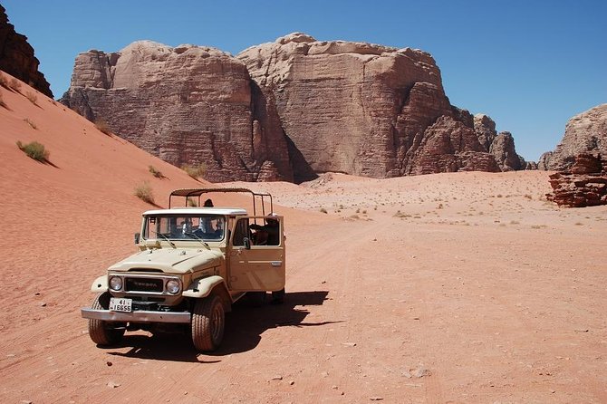 Wadi Rum Jeep Tour & Camp; Overnight - Stop 1 to 4: Lawrence’s Spring, the red dune, and Jebel Khazali