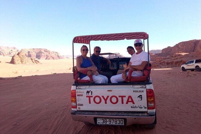 Wadi Rum trip from Aqaba, round trip, includes a 2 -hour jeep - Wadi Rum sights: desert, rare sands, and “western-shaped” mountains